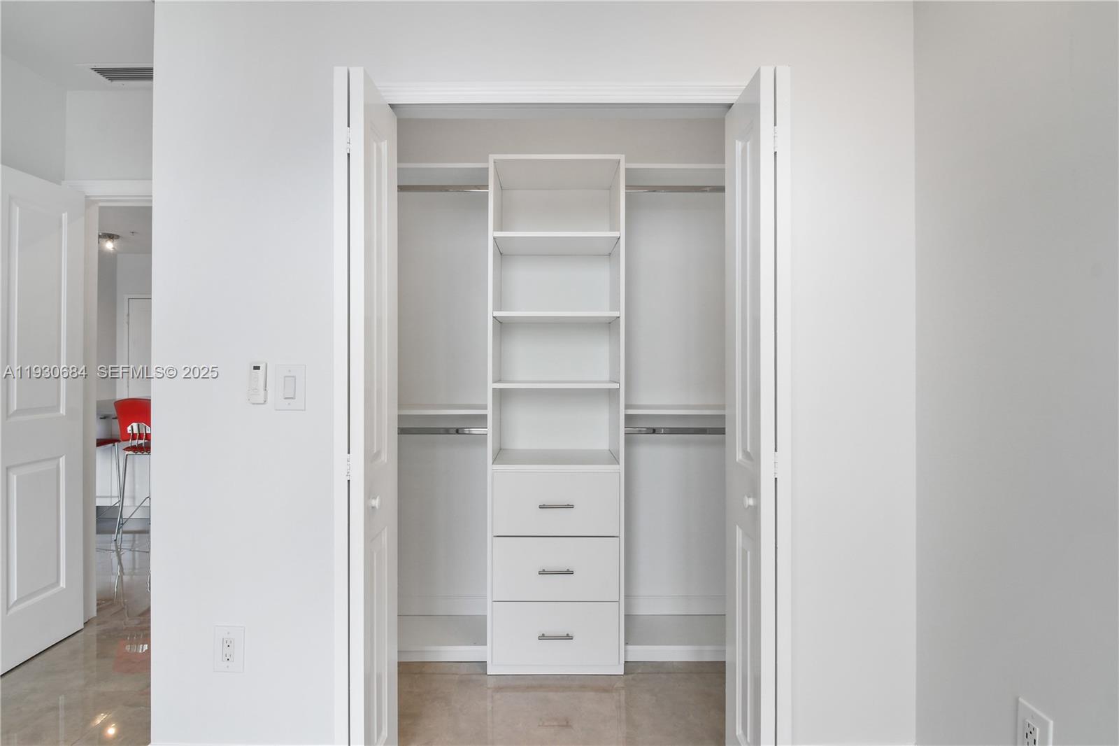 2650 Southwest 37th Avenue, Unit 901 Miami, FL 33134 - Photo 20 of 31 a view of an empty walk in closet