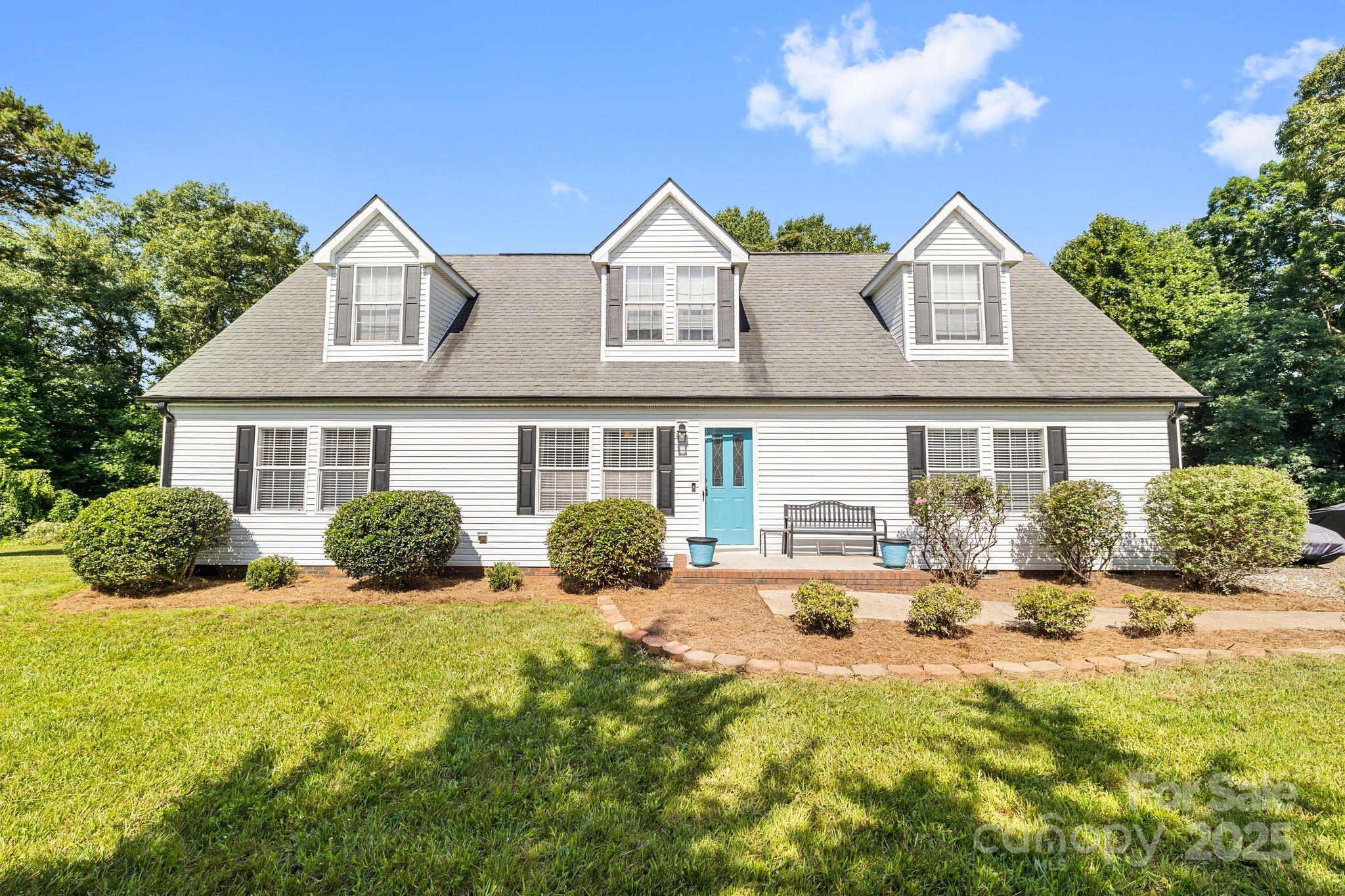 118 Grain Drive Stony Point, NC 28678 - Photo 2 of 31 a front view of house with yard and green space