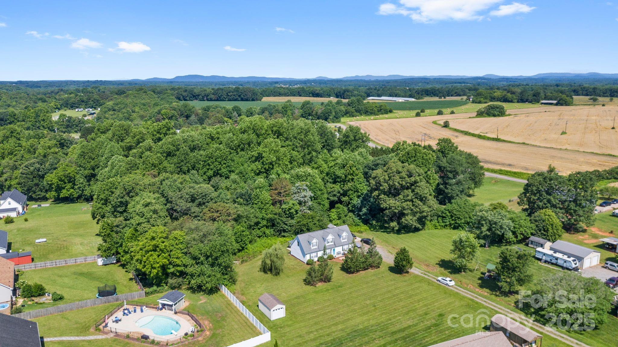 118 Grain Drive Stony Point, NC 28678 - Photo 25 of 31 a view of a lake with a yard