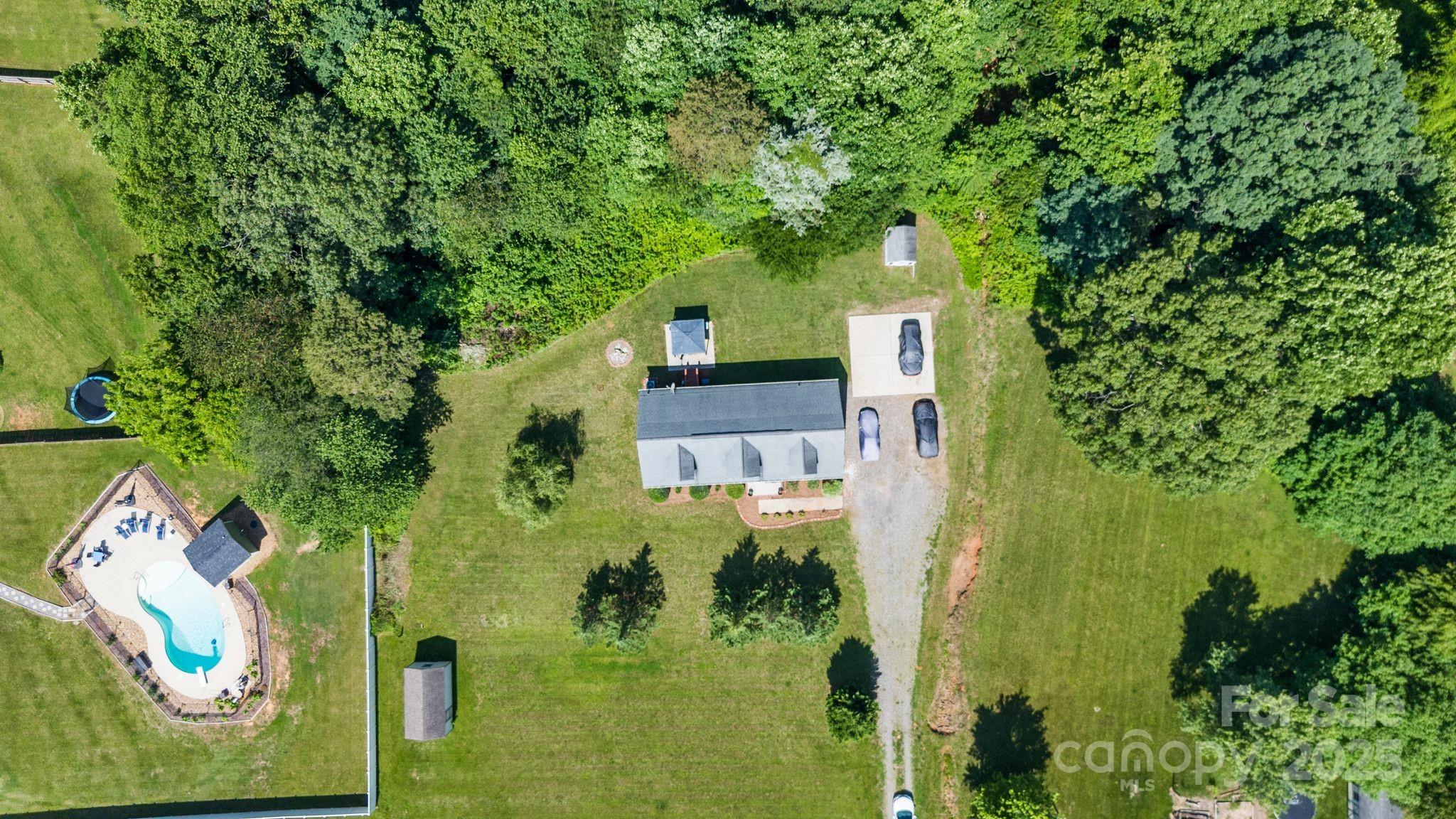 118 Grain Drive Stony Point, NC 28678 - Photo 30 of 31 an aerial view of a house with a yard