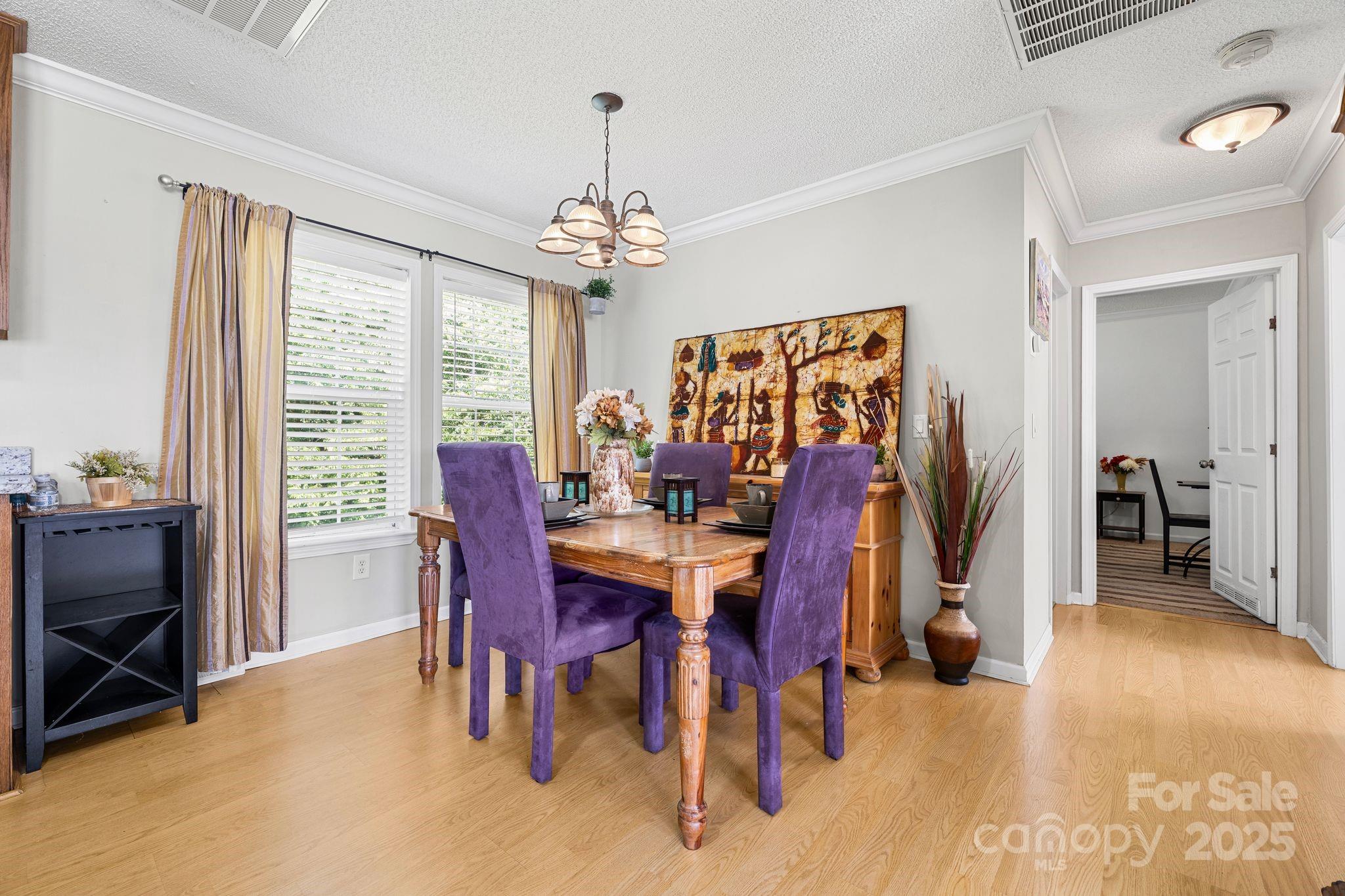 118 Grain Drive Stony Point, NC 28678 - Photo 9 of 31 a view of a dining room with furniture window and outside view