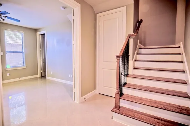 a view of an entryway with staircase