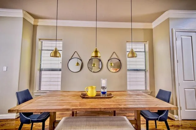 a view of a table and chairs in a room