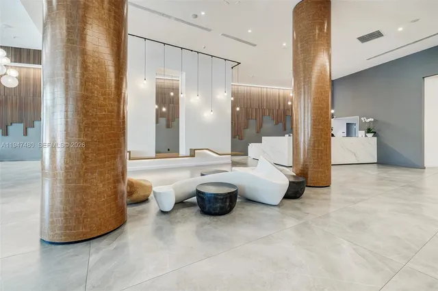 a bathroom with a toilet sink and shower