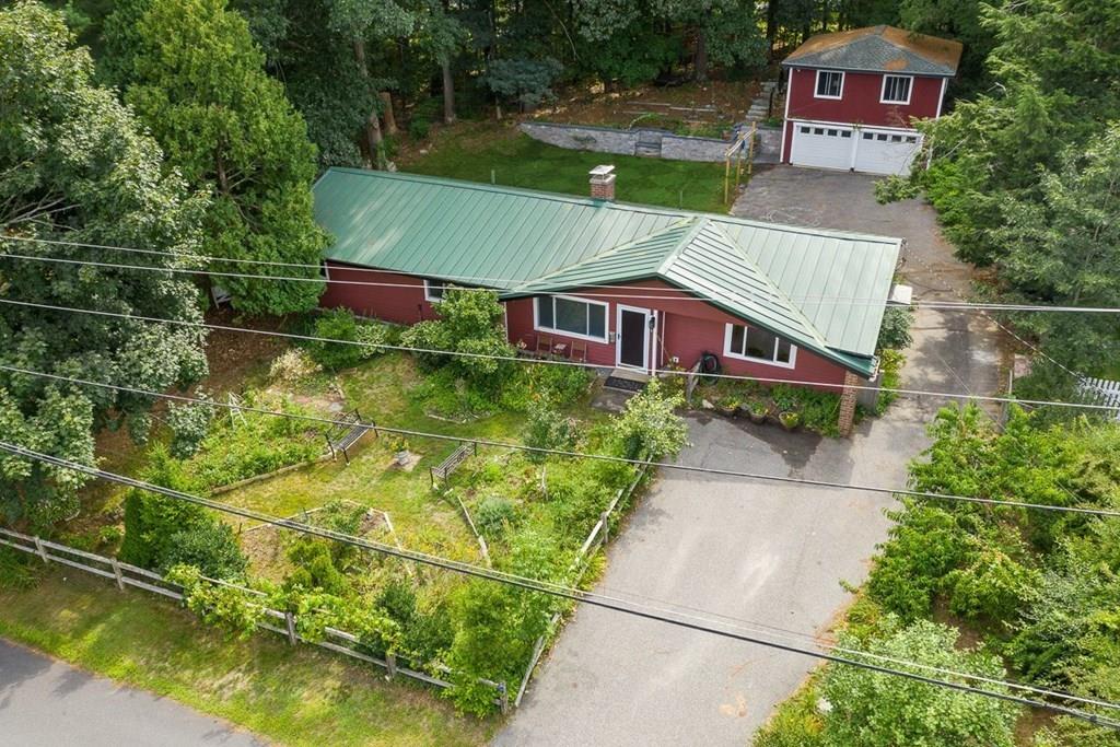9 Temi Road Chelmsford, MA 01824 - Photo 1 of 28 an aerial view of a house with a yard and a fountain