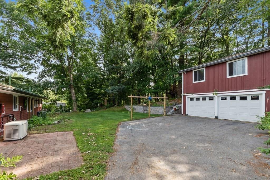 9 Temi Road Chelmsford, MA 01824 - Photo 2 of 28 a view of a house with a yard