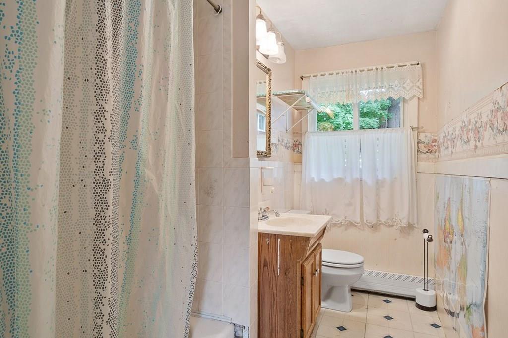 9 Temi Road Chelmsford, MA 01824 - Photo 21 of 28 a bathroom with a toilet a sink and a shower