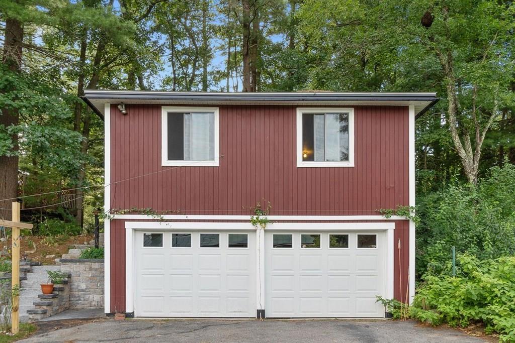9 Temi Road Chelmsford, MA 01824 - Photo 22 of 28 a front view of a house with a yard