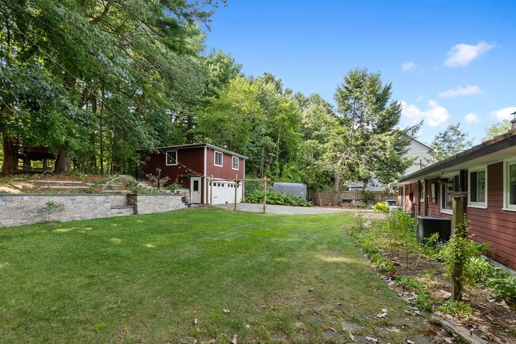 9 Temi Road Chelmsford, MA 01824 - Photo 4 of 28 a house view with a outdoor space