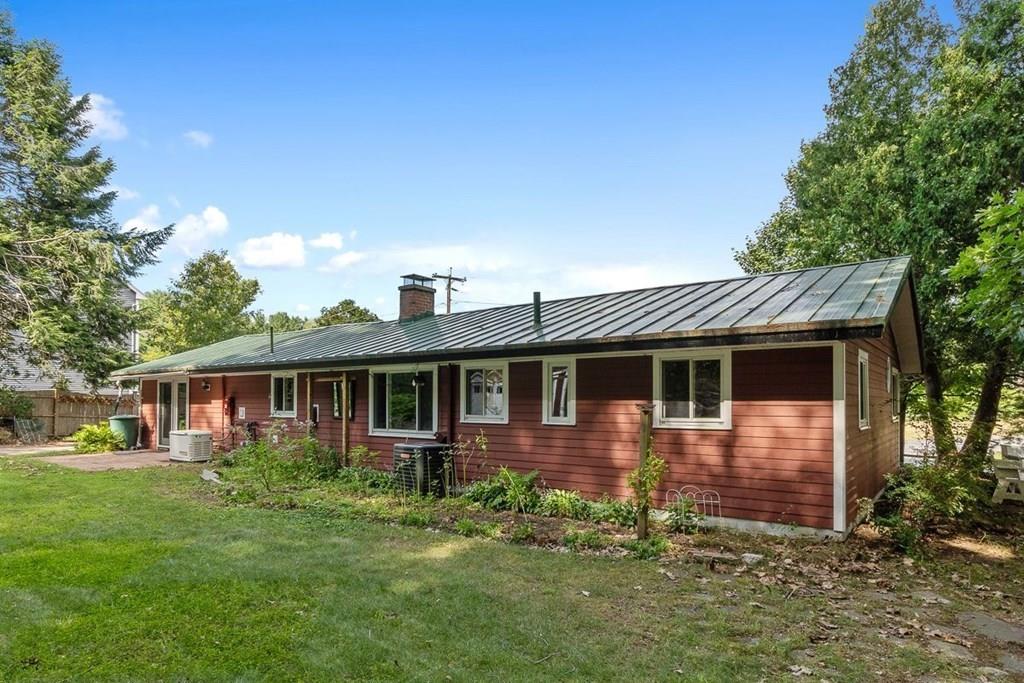 9 Temi Road Chelmsford, MA 01824 - Photo 5 of 28 a front view of house with yard and green space