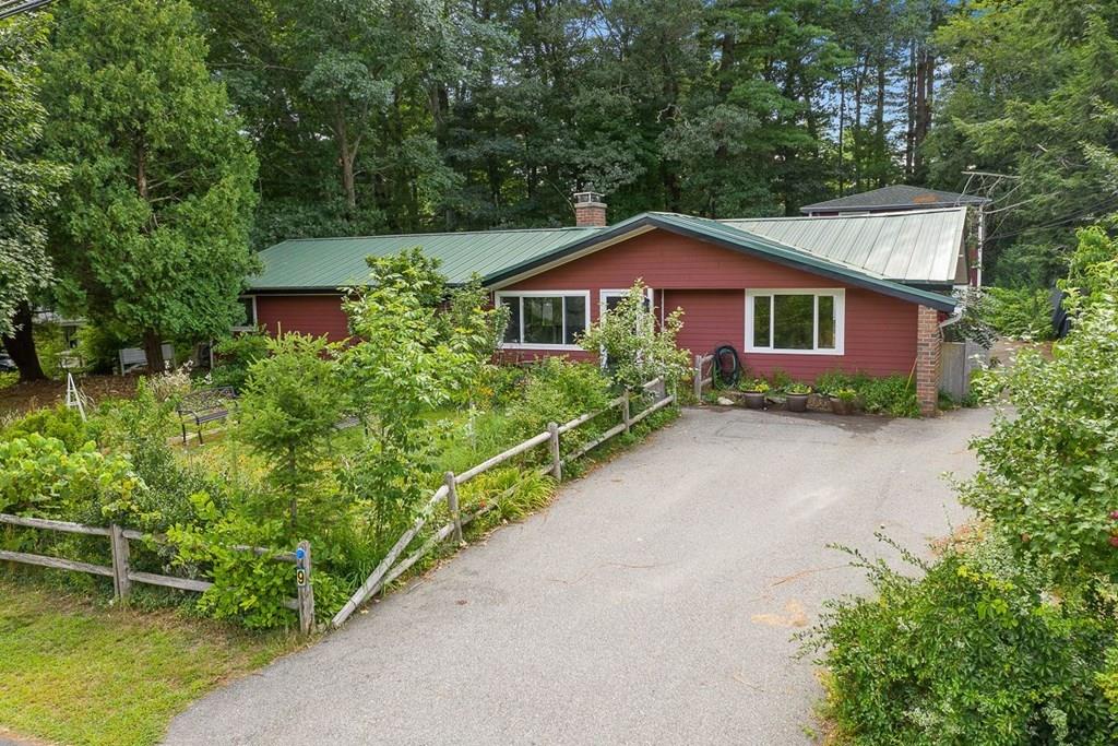 9 Temi Road Chelmsford, MA 01824 - Photo 6 of 28 front view of a house with a yard