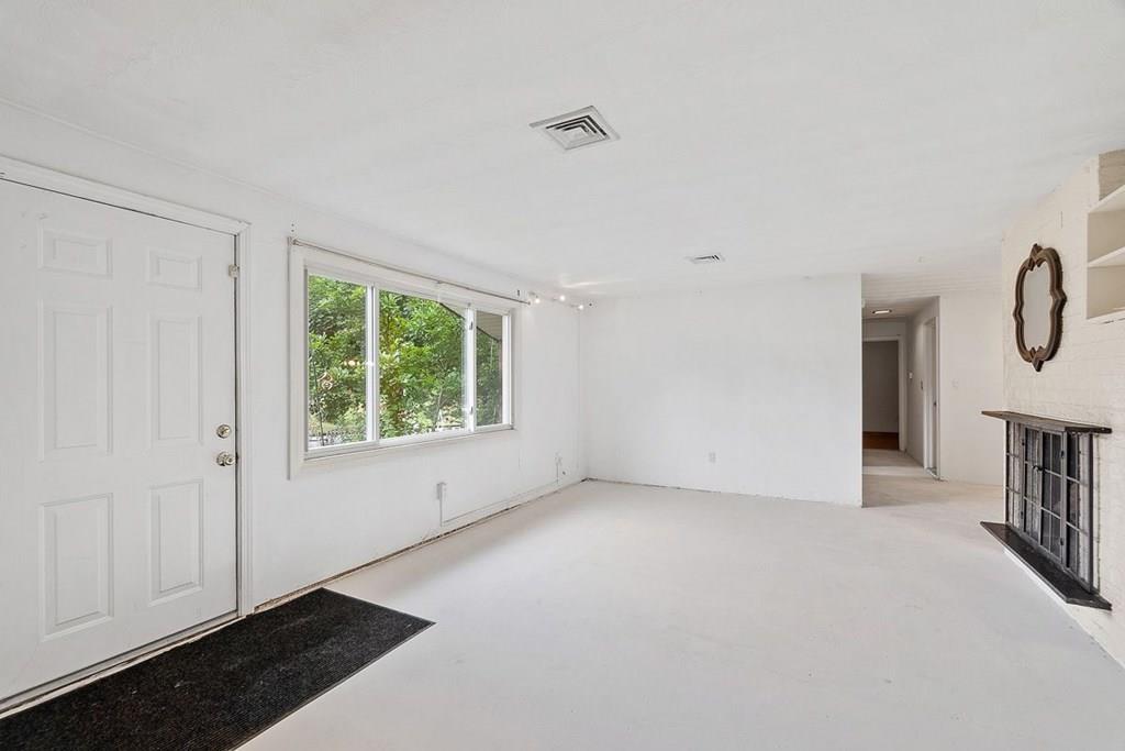 9 Temi Road Chelmsford, MA 01824 - Photo 8 of 28 a view of an empty room with windows