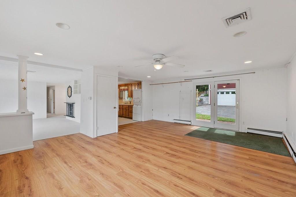 9 Temi Road Chelmsford, MA 01824 - Photo 10 of 28 a big room with wooden floor and windows