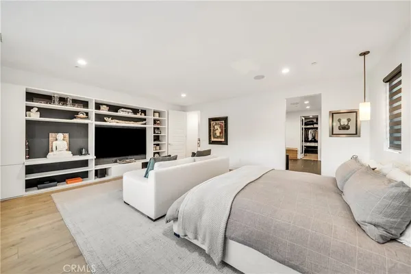 a spacious bathroom with a bathtub and a shower
