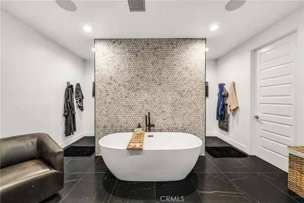 a bed room with a bed and a window