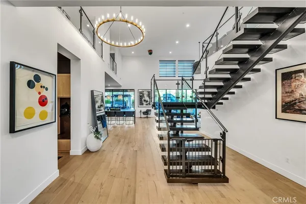 a view of a patio with dining table and chairs