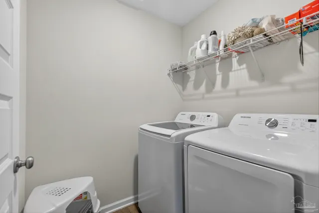 a bedroom with a bed and a book shelf