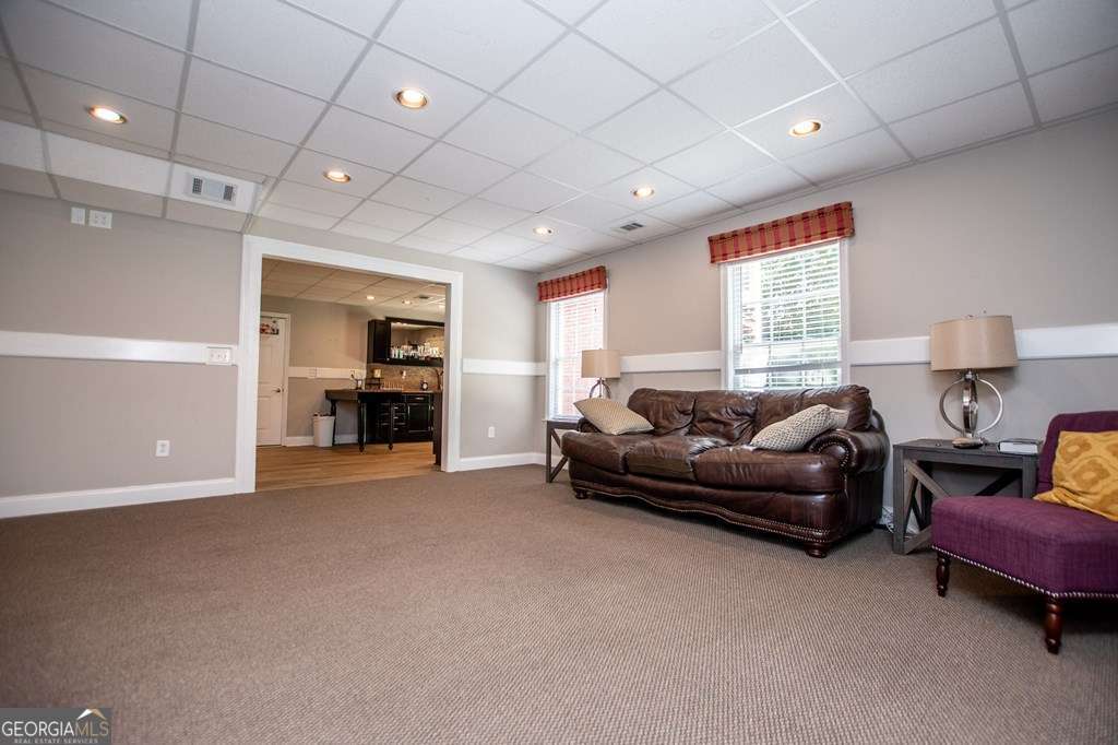 204 Pinehurst Way Carrollton, GA 30116 - Photo 38 of 61 a living room with furniture and a window