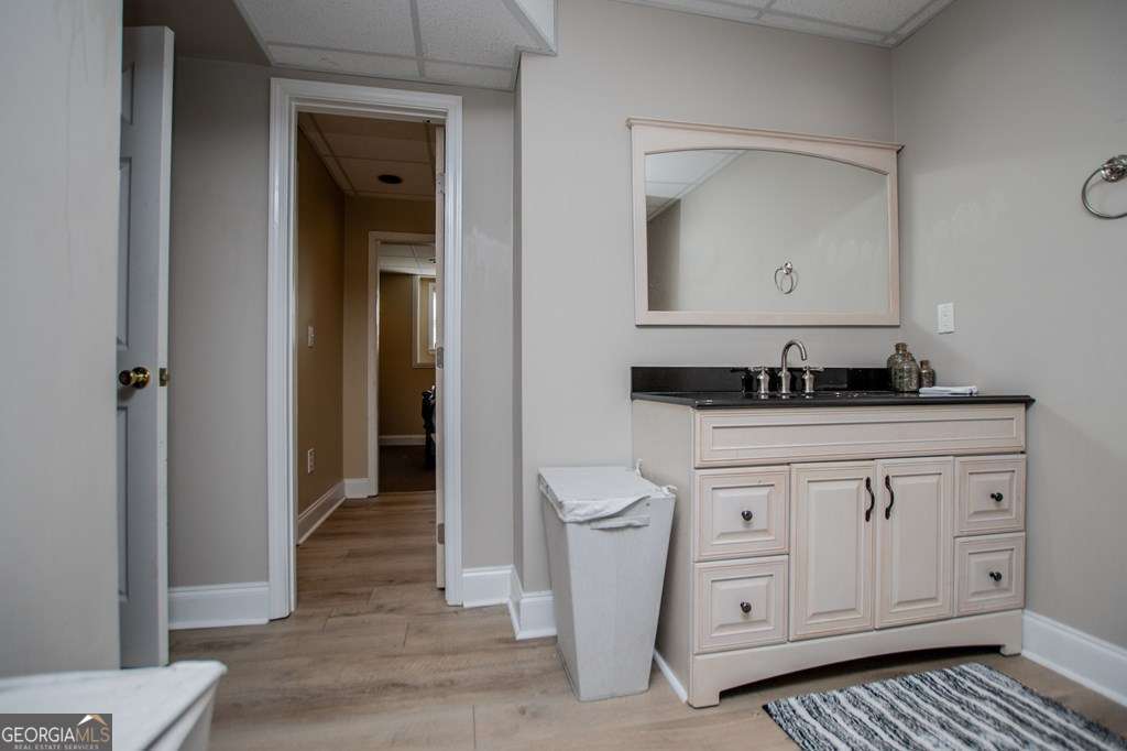 204 Pinehurst Way Carrollton, GA 30116 - Photo 42 of 61 a bathroom with a sink and a mirror