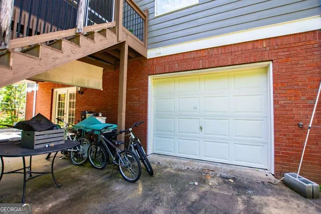 front view of house with a yard and a table and chairs