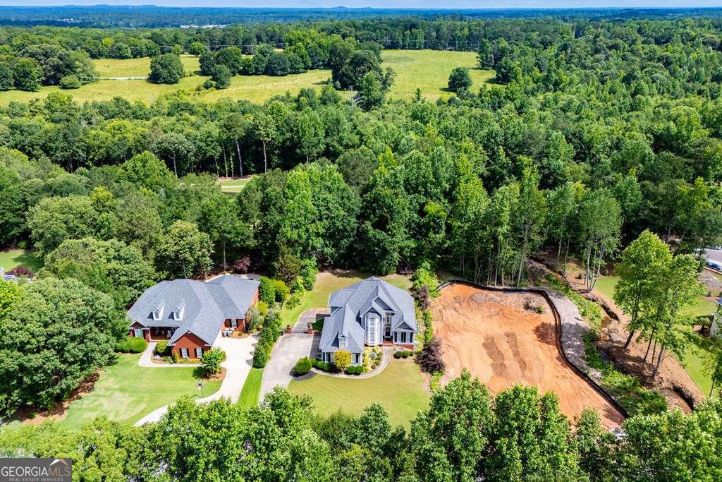 204 Pinehurst Way Carrollton, GA 30116 - Photo 52 of 61 an aerial view of residential house with outdoor space and trees all around