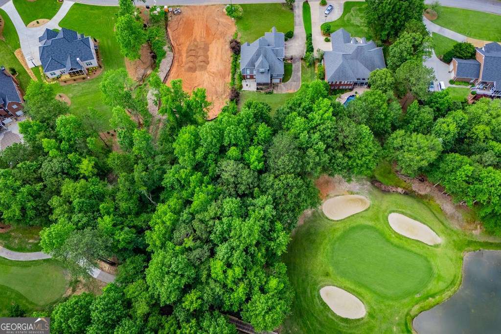 204 Pinehurst Way Carrollton, GA 30116 - Photo 54 of 61 an aerial view of a golf course with a swimming pool