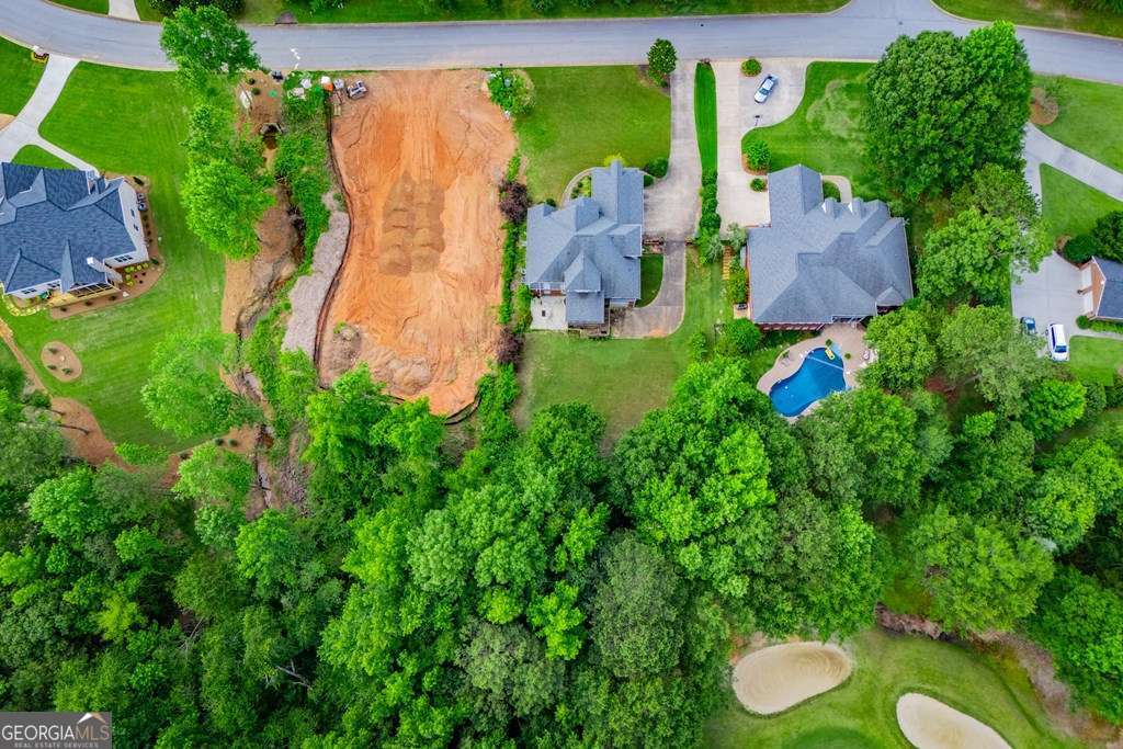 204 Pinehurst Way Carrollton, GA 30116 - Photo 55 of 61 an aerial view of a house with swimming pool and garden