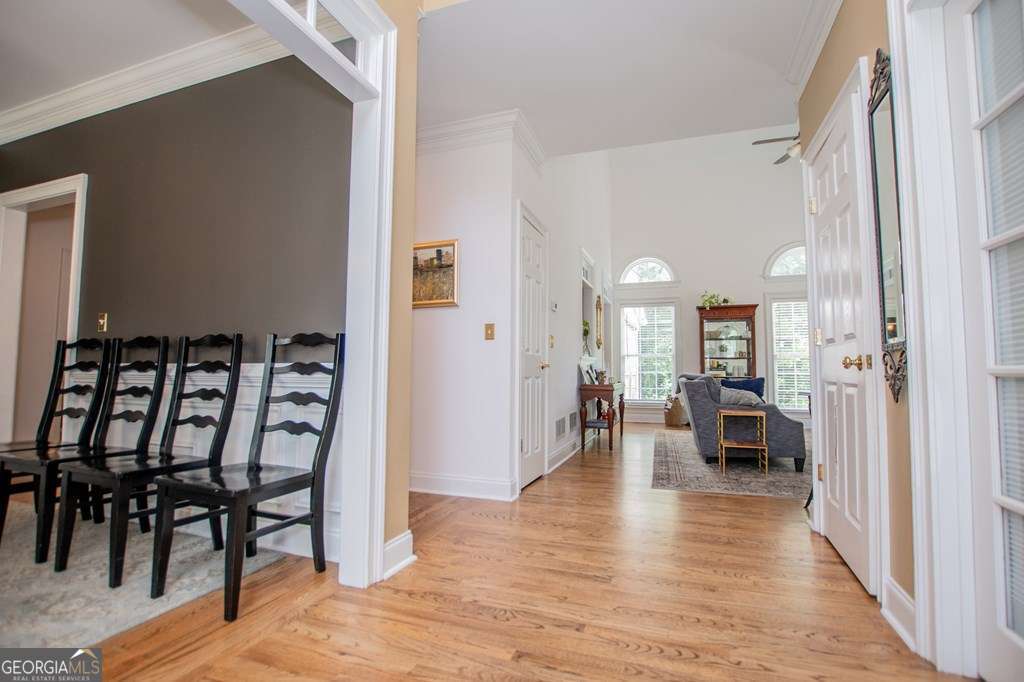 204 Pinehurst Way Carrollton, GA 30116 - Photo 6 of 61 a view of a a dining room with furniture window and wooden floor