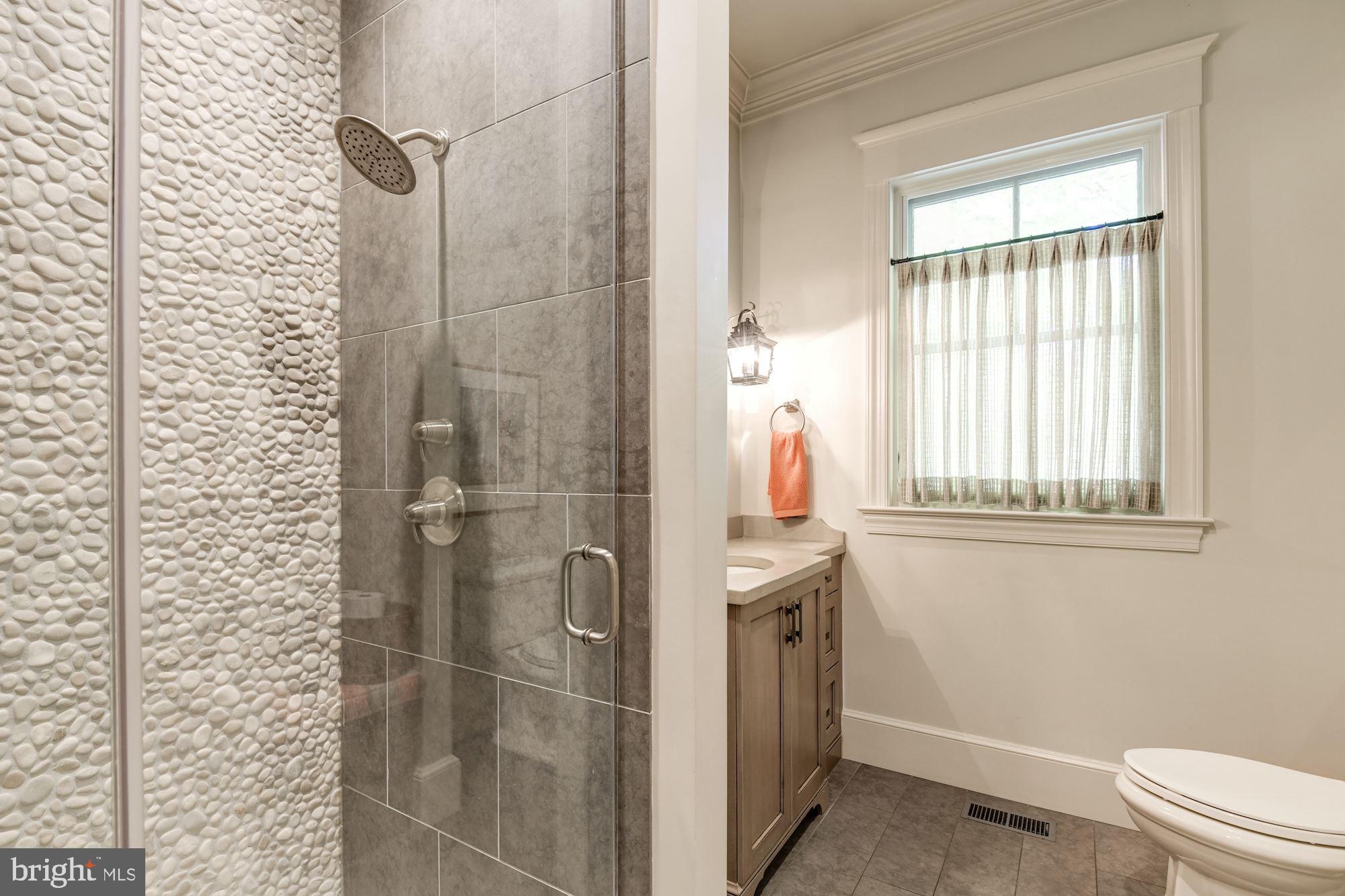 9115 Burning Tree Road Bethesda, MD 20817 - Photo 18 of 65 Full Bathroom w/ Laundry off Mudroom