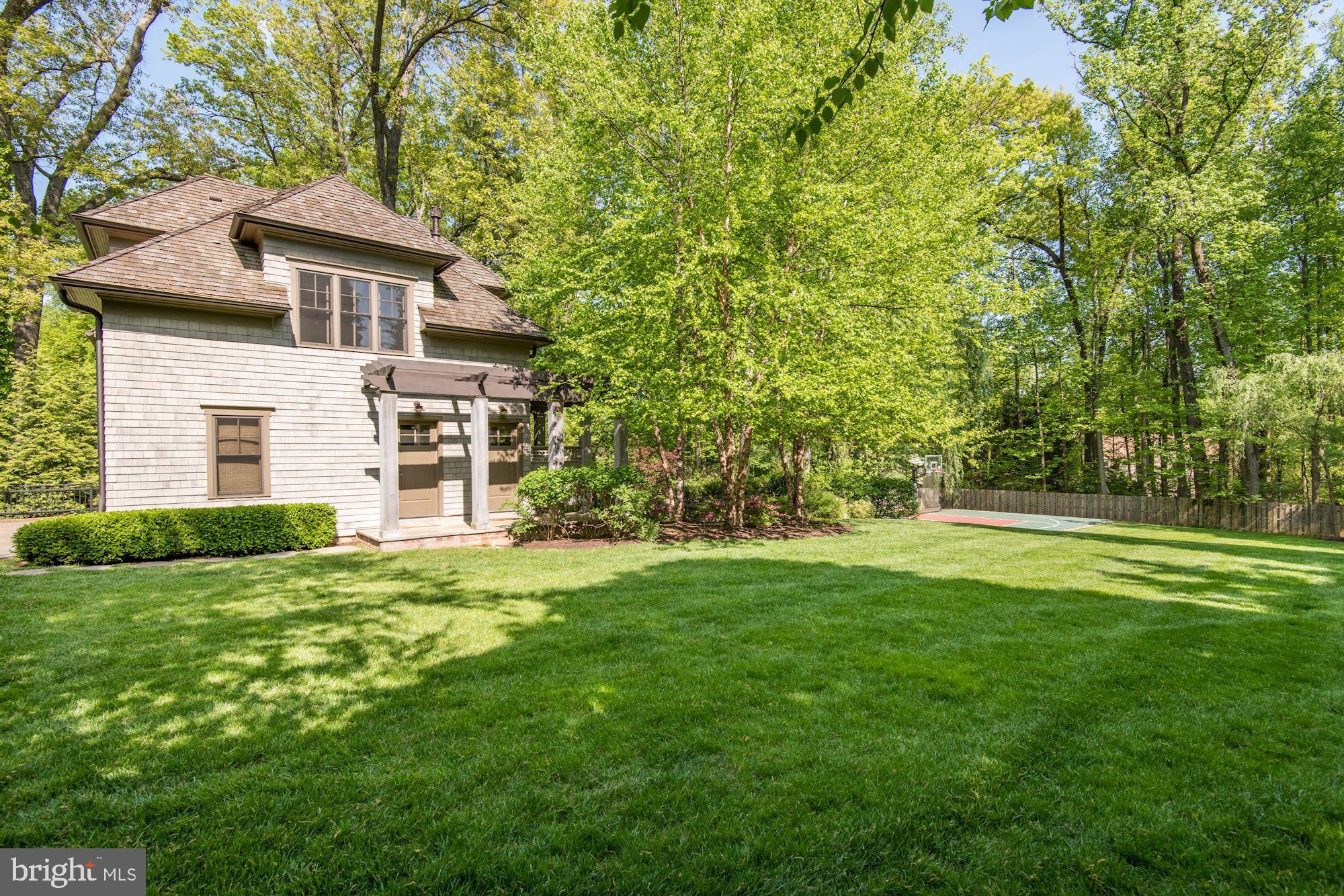 9115 Burning Tree Road Bethesda, MD 20817 - Photo 59 of 65 Backyard with detached garage