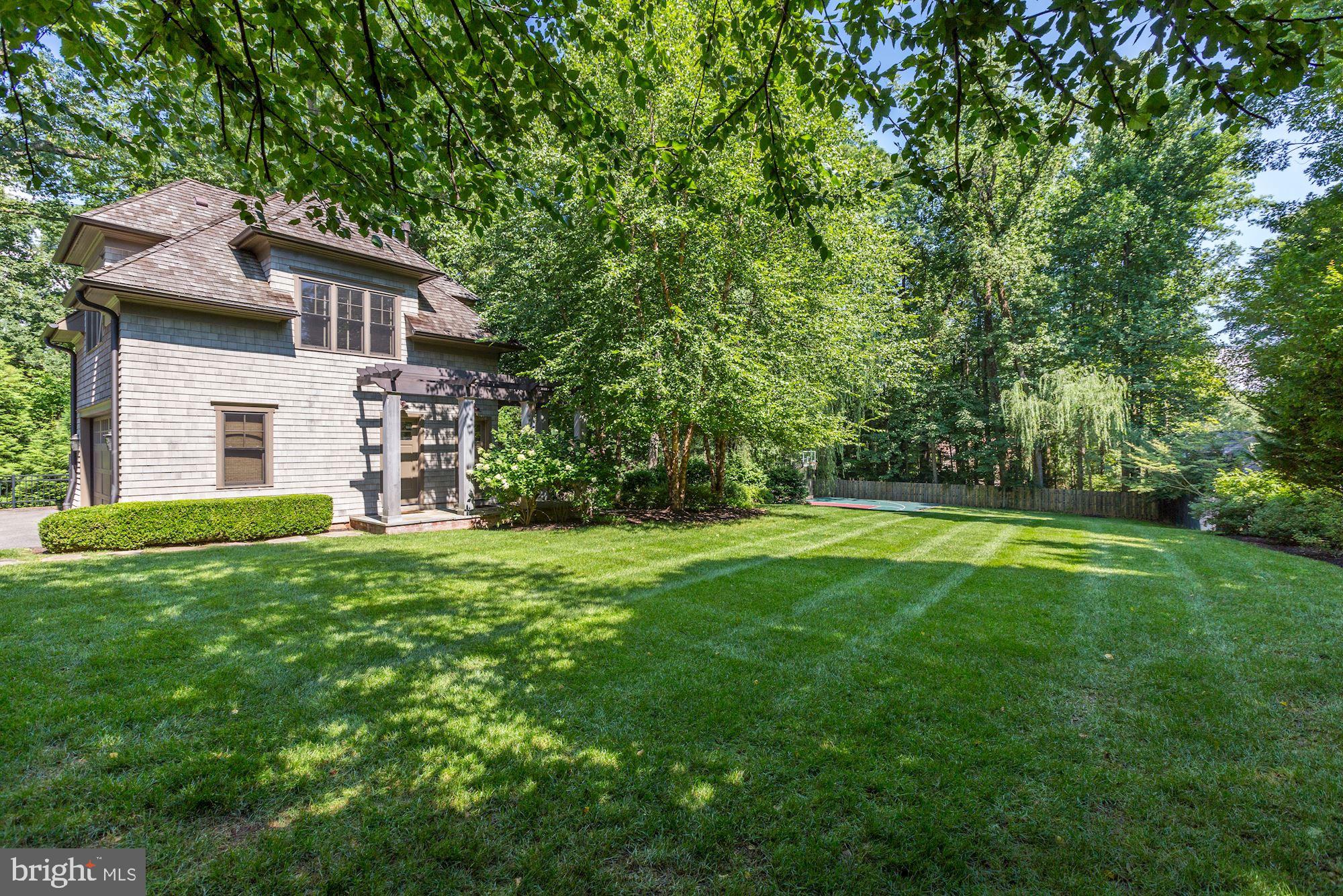 9115 Burning Tree Road Bethesda, MD 20817 - Photo 60 of 65 Backyard with detached garage