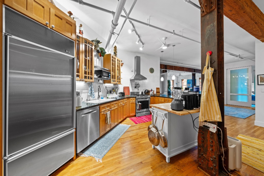 165 Duane Street, Unit 6A Manhattan, NY 10013 - Photo 16 of 29 a very nice looking room with a couch