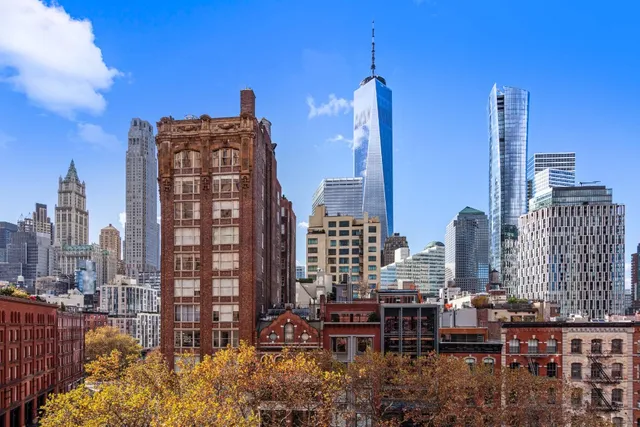 a front view of a city with tall buildings