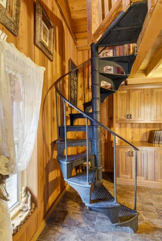 a view of swimming pool with an outdoor seating