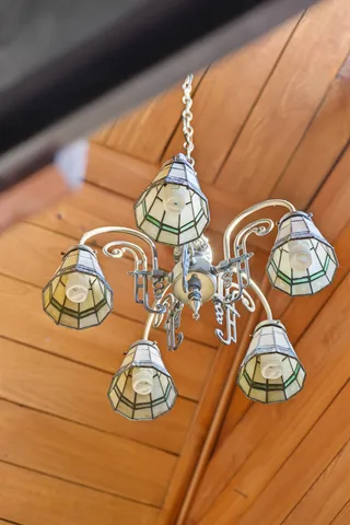 a swimming pool with trees in the background