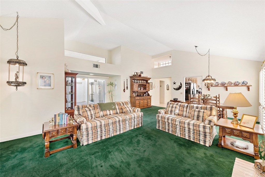 24941 Danamaple Dana Point, CA 92629 - Photo 12 of 28 a bed room with a bed and a wooden floor