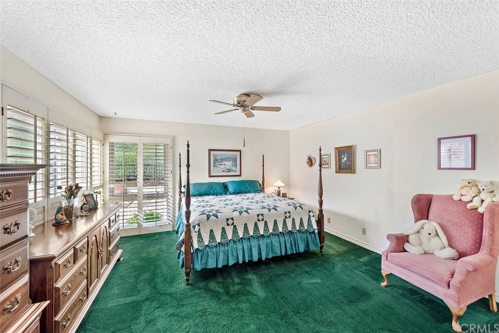 24941 Danamaple Dana Point, CA 92629 - Photo 15 of 28 a living room with a bed furniture and a large window