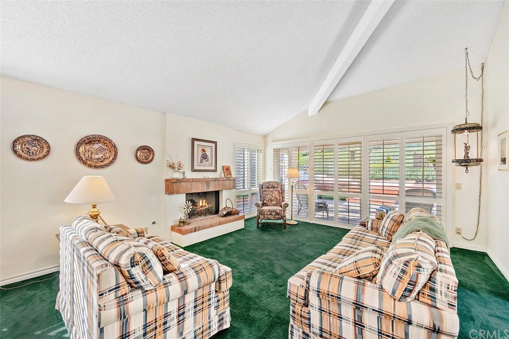 24941 Danamaple Dana Point, CA 92629 - Photo 10 of 28 a bedroom with two beds and a large window