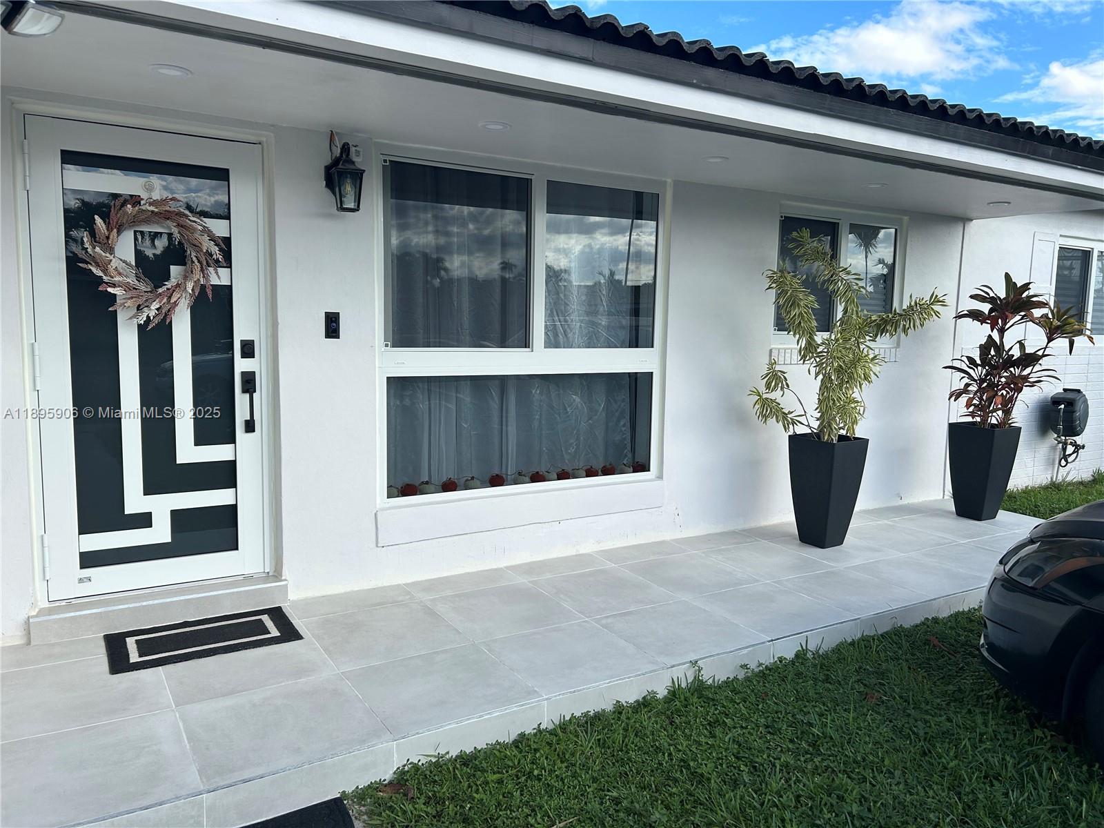 a view of the house with outdoor space