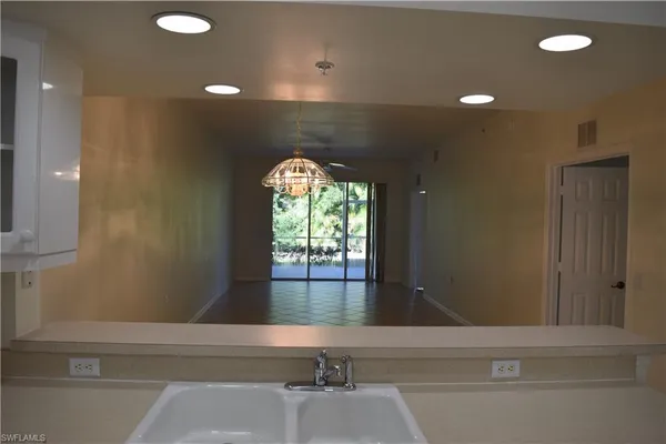 a view of entryway with a front door