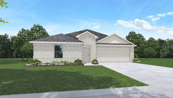 a front view of a house with a garden and yard