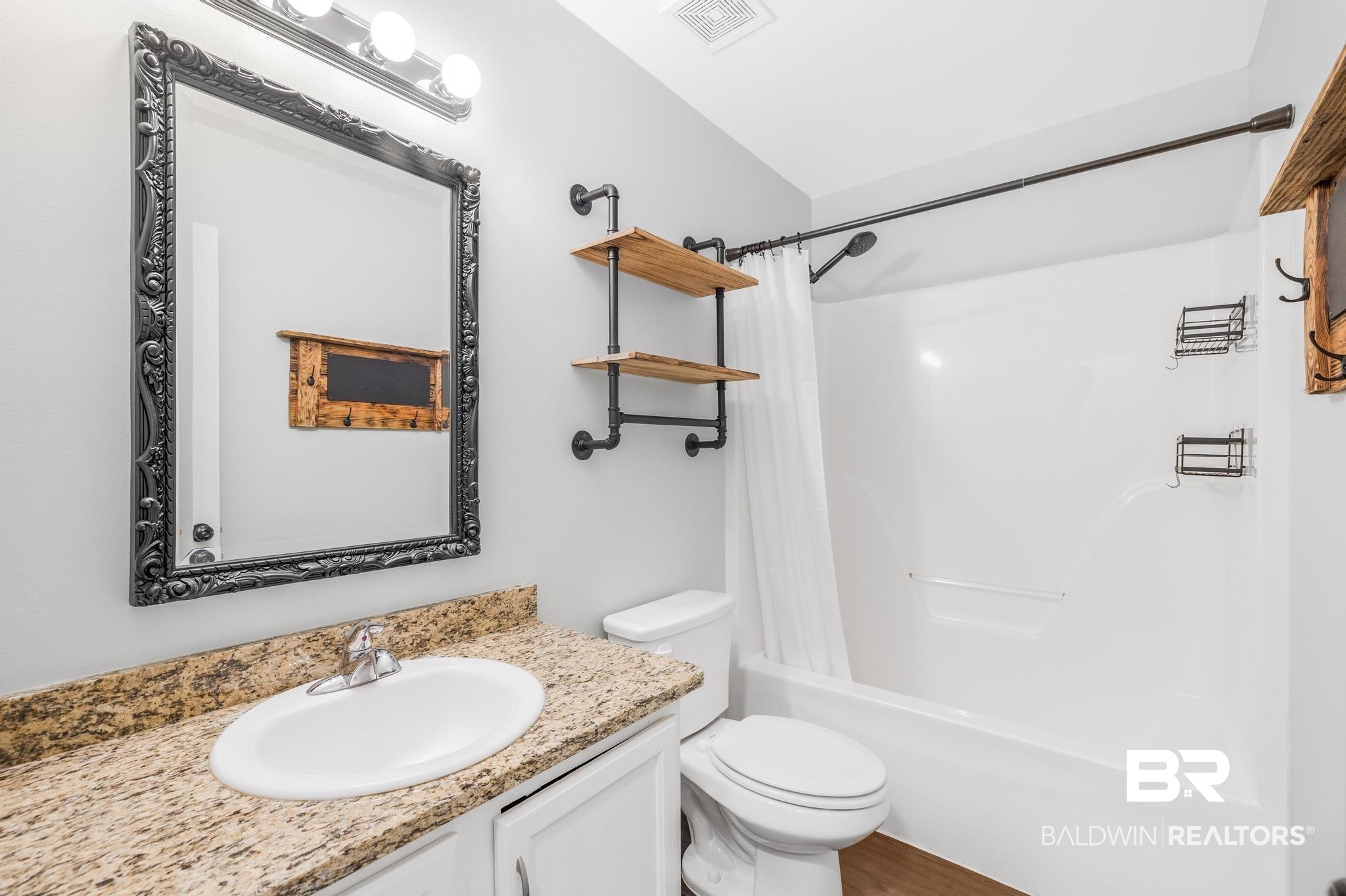 140 Hope Drive Daphne, AL 36526 - Photo 33 of 54 Bathroom with vanity and shower / bath combo with shower curtain