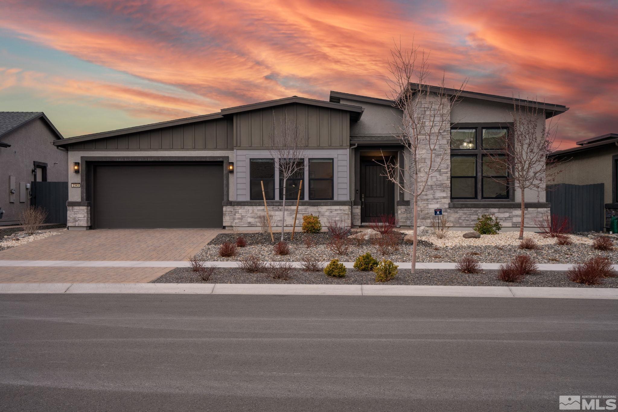 a front view of house with a yard