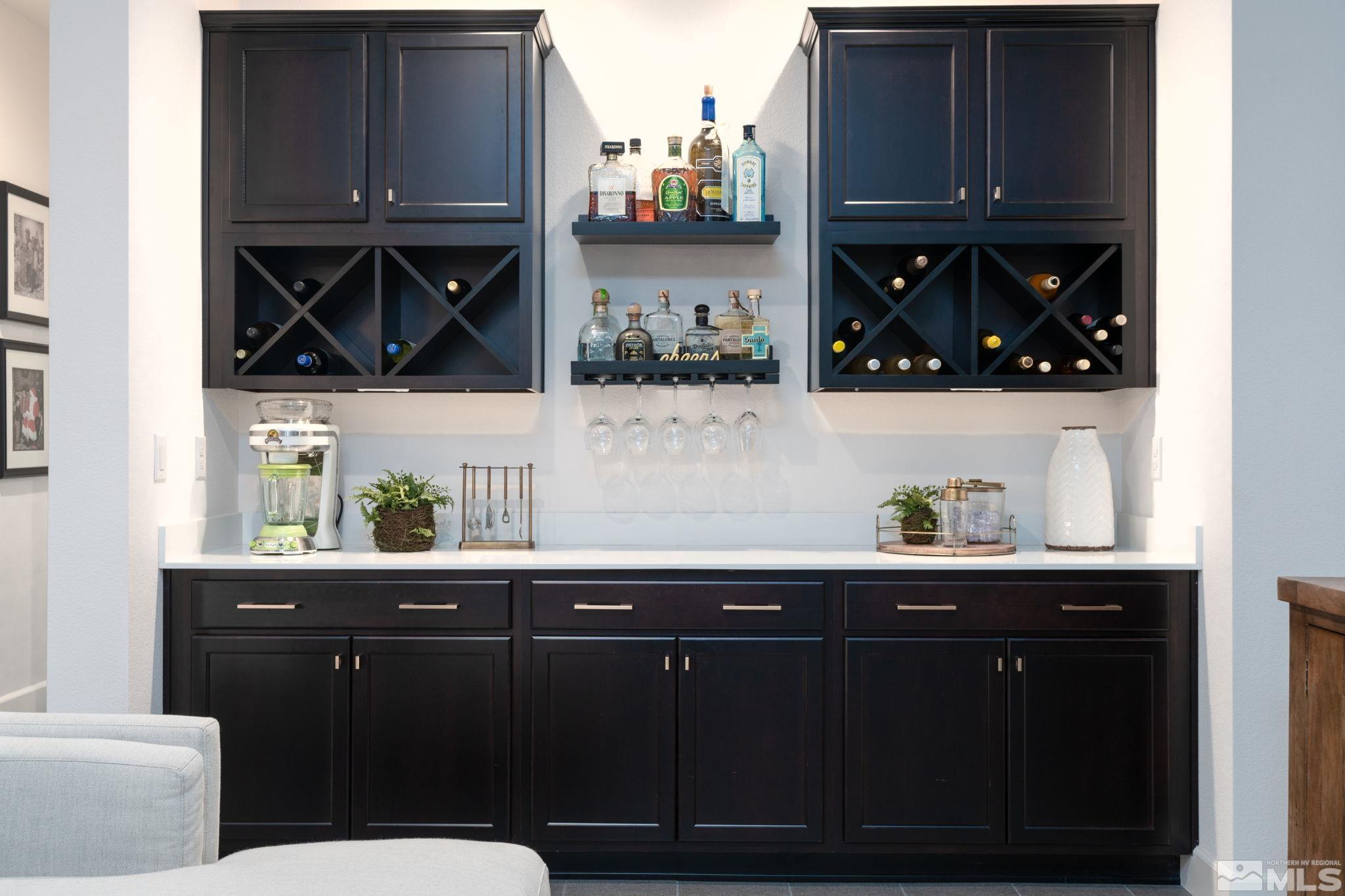 2343 Iron Square Drive Reno, NV 89521 - Photo 13 of 35 a kitchen with a sink cabinets and wooden floor
