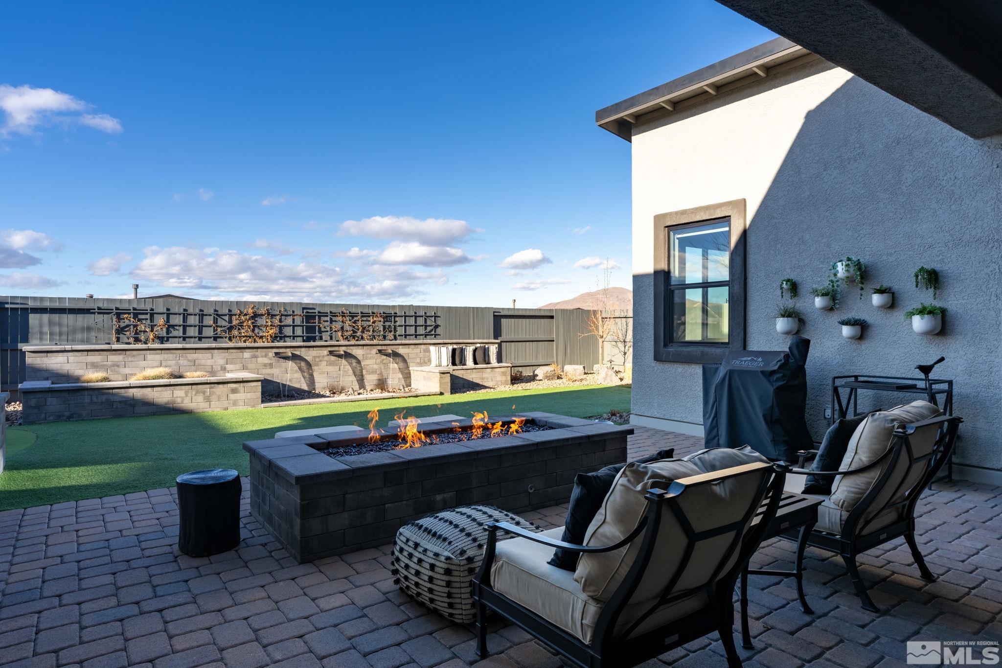 2343 Iron Square Drive Reno, NV 89521 - Photo 25 of 35 a view of a chairs and table in patio