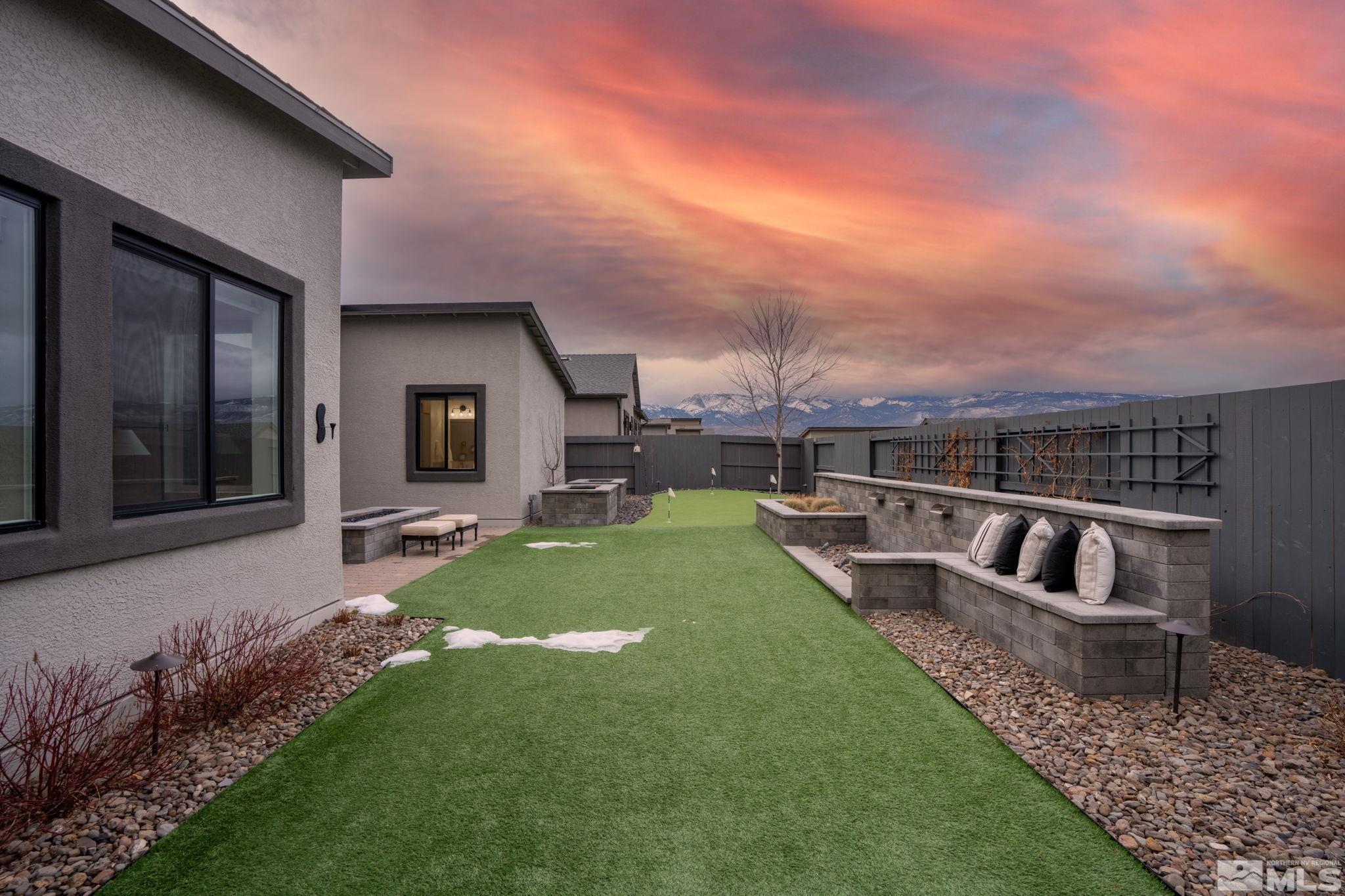 2343 Iron Square Drive Reno, NV 89521 - Photo 27 of 35 a view of a backyard with couches plants and large tree