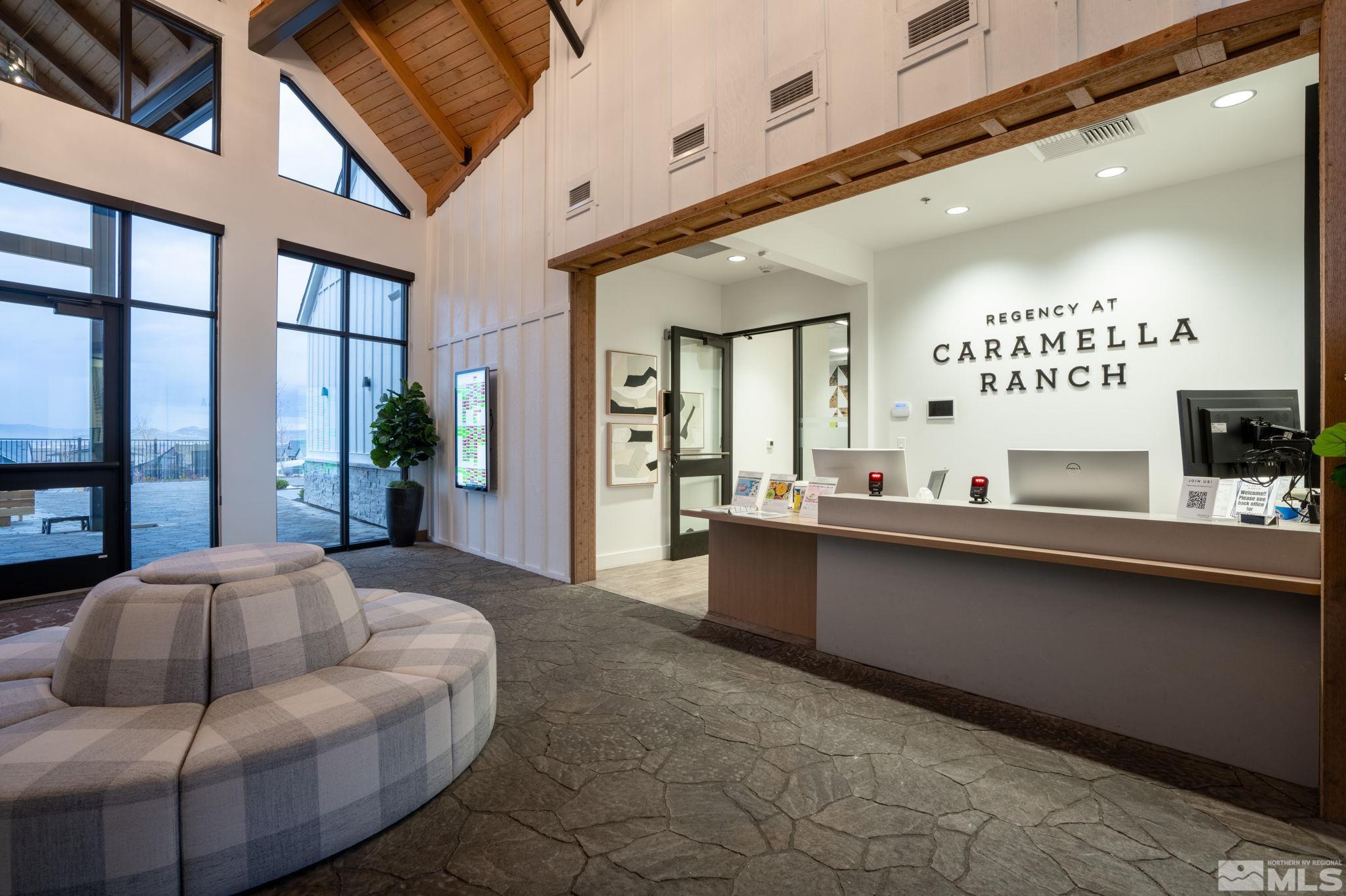 2343 Iron Square Drive Reno, NV 89521 - Photo 34 of 35 a living room with furniture and a large window