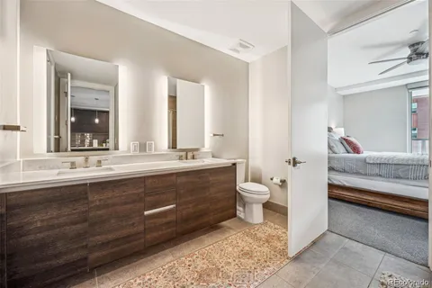 a bathroom with a sink and a large mirror