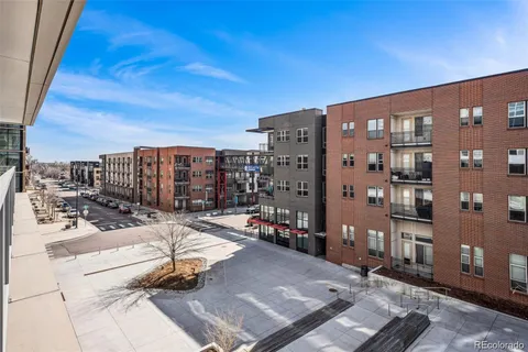 a view of a city with tall buildings
