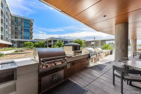 a view of a kitchen with a stove and a microwave